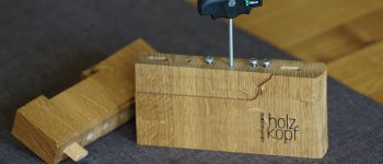 Werkzeug- und Schraubenaufbewahrung zur Befestigung der Ansteckplatte